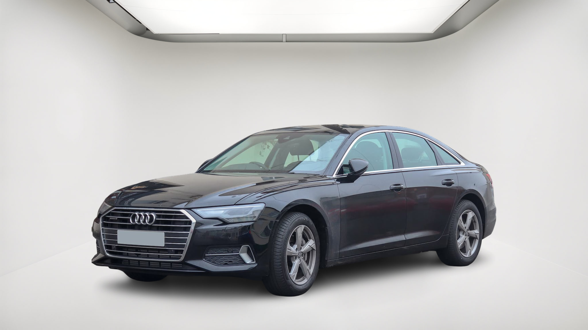 Audi photo edited with LotReady in a light studio, with the original reflections still visible on the body